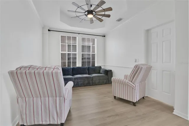 a living room with furniture and a window