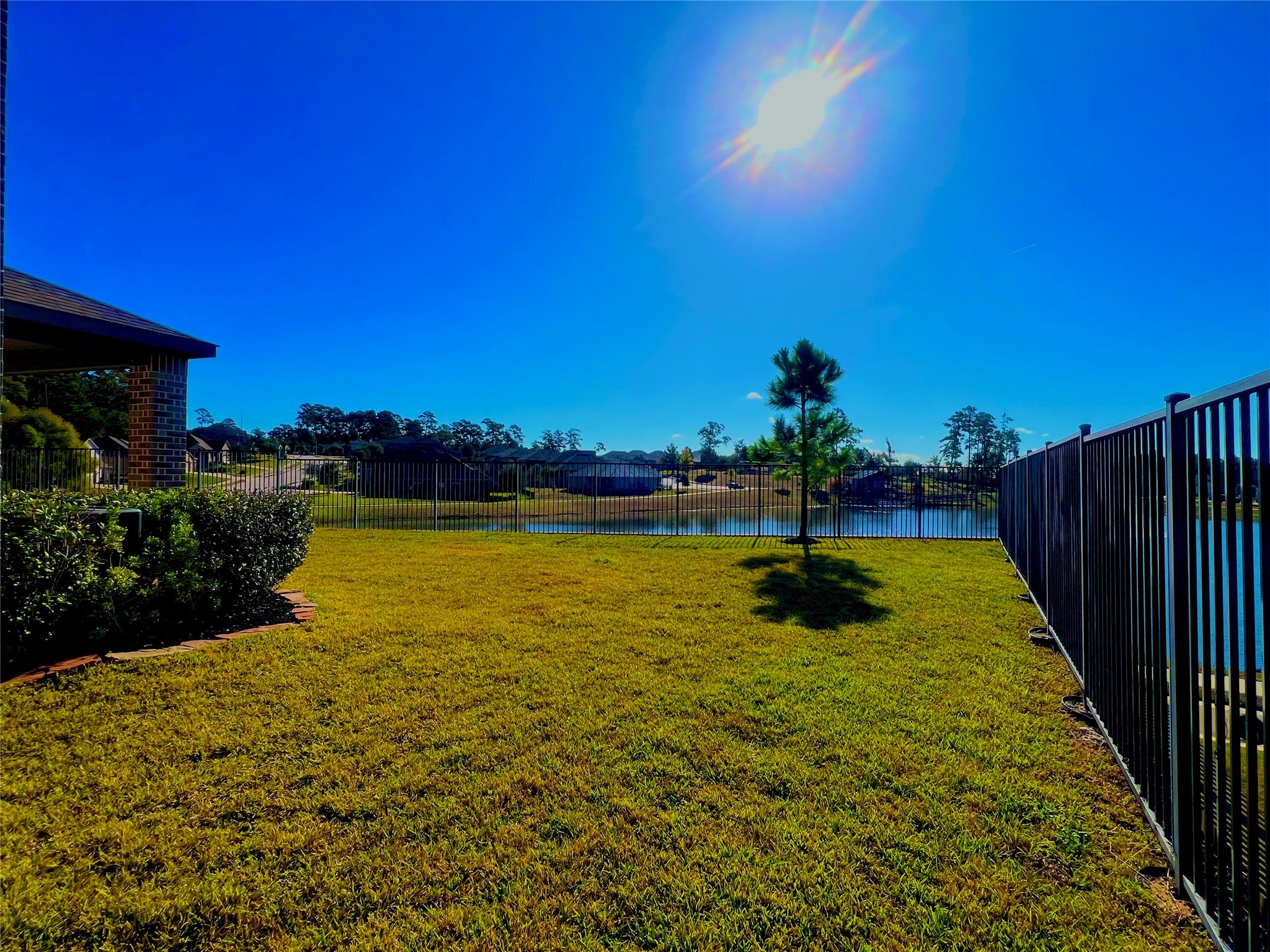 708 Fallen Hemlock Court Conroe, TX 77304 - Photo 15 of 15 a swimming pool with an outdoor space and seating