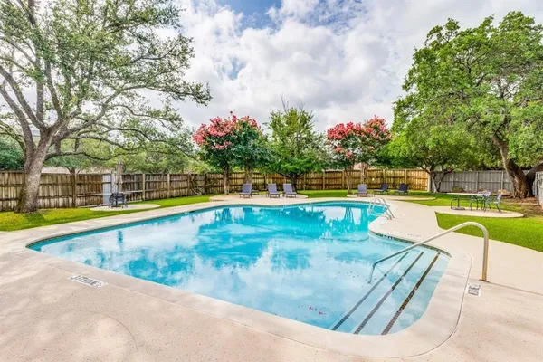 swimming pool with outdoor seating