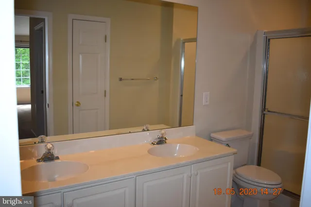 a bathroom with a sink and a toilet