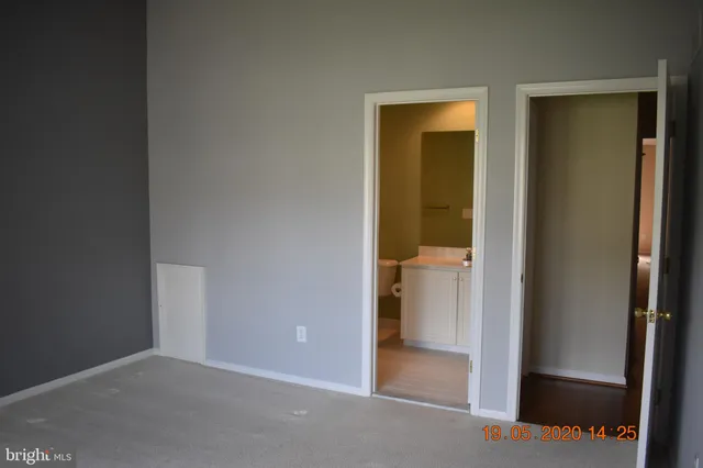 an empty room and closet