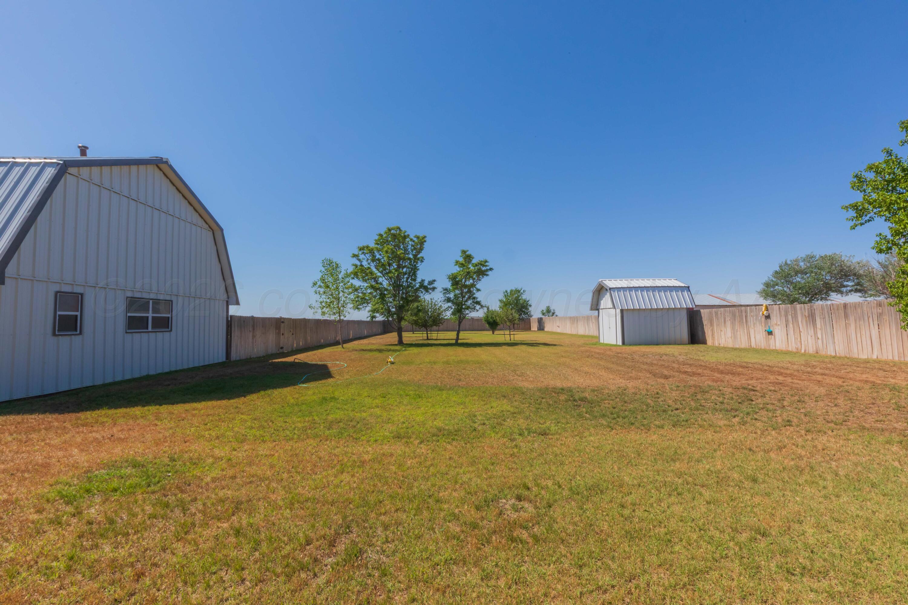 1201 West McCormick Road Amarillo, TX 79118 - Photo 36 of 38 a house with a yard