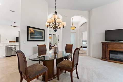 a view of a dining room with furniture