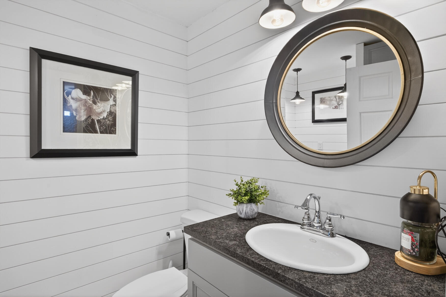 48 Holly Ridge Drive Sandwich, MA 02563 - Photo 18 of 48 a bathroom with a toilet a sink and a mirror