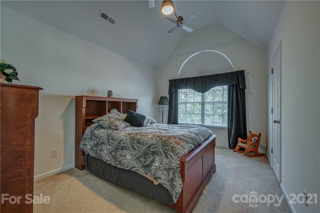 5202 Sunriver Road Gastonia, NC 28054 - Photo 22 of 29 a bedroom with a bed and a window