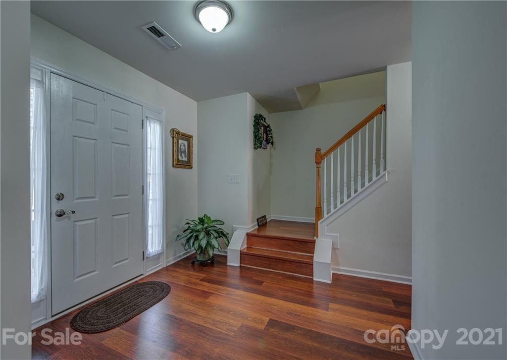 5202 Sunriver Road Gastonia, NC 28054 - Photo 4 of 29 a view of entryway and stairs