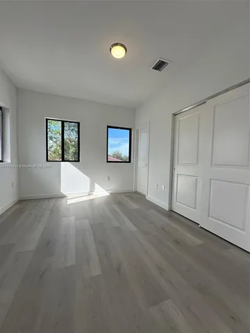 a view of livingroom with hardwood floor and window
