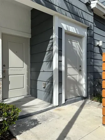 a view of entrance gate of a house
