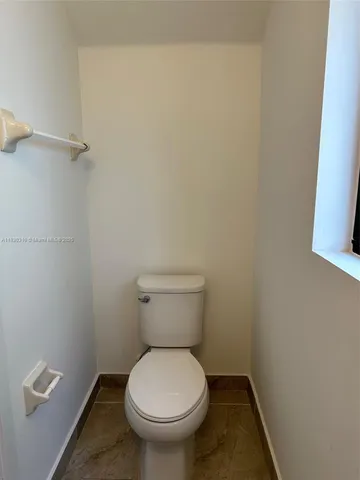 a bathroom with a toilet