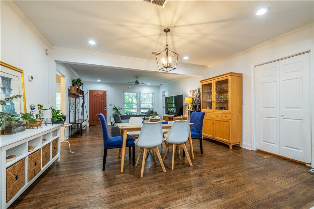 1760 Rogers Avenue Southwest Atlanta, GA 30310 - Photo 11 of 57 a view of a dining room with furniture and wooden floor