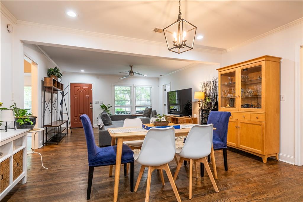 1760 Rogers Avenue Southwest Atlanta, GA 30310 - Photo 13 of 57 a view of a dining room with furniture window and wooden floor