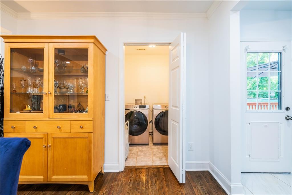 1760 Rogers Avenue Southwest Atlanta, GA 30310 - Photo 15 of 57 a view of a door and chair in a room