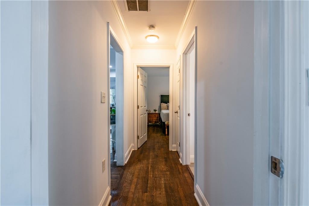1760 Rogers Avenue Southwest Atlanta, GA 30310 - Photo 32 of 57 a view of a hallway with a livingroom and a bathroom with a sink