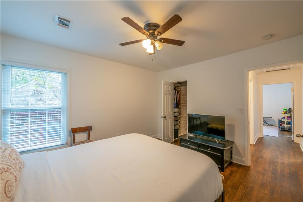 1760 Rogers Avenue Southwest Atlanta, GA 30310 - Photo 36 of 57 a bedroom with a bed and a flat screen tv