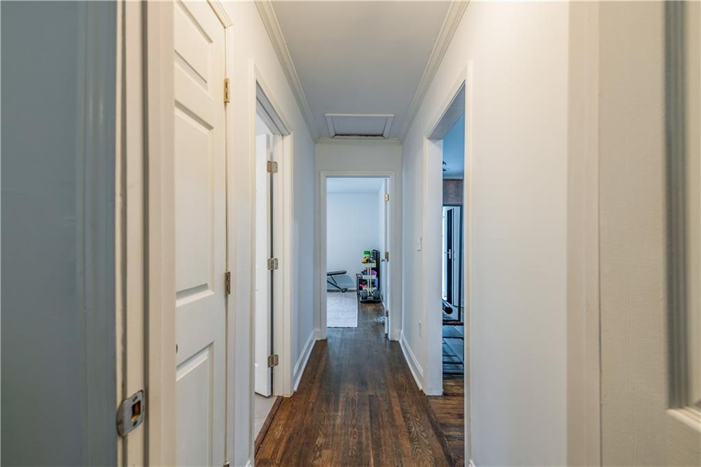 1760 Rogers Avenue Southwest Atlanta, GA 30310 - Photo 37 of 57 a view of a hallway with wooden floor and staircase