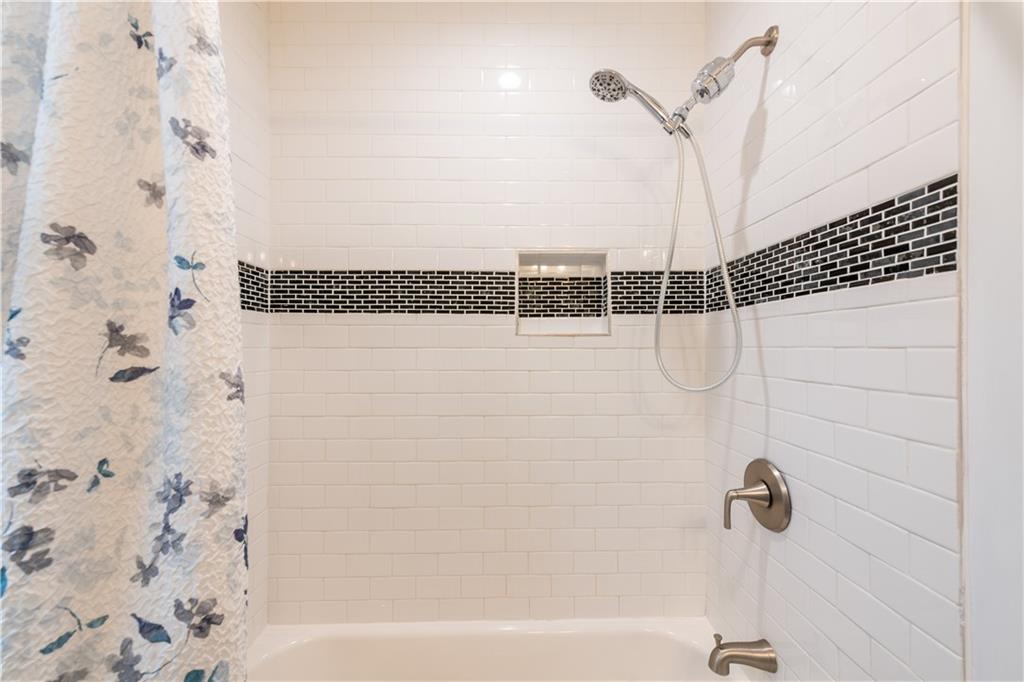 1760 Rogers Avenue Southwest Atlanta, GA 30310 - Photo 40 of 57 a bathroom with a shower