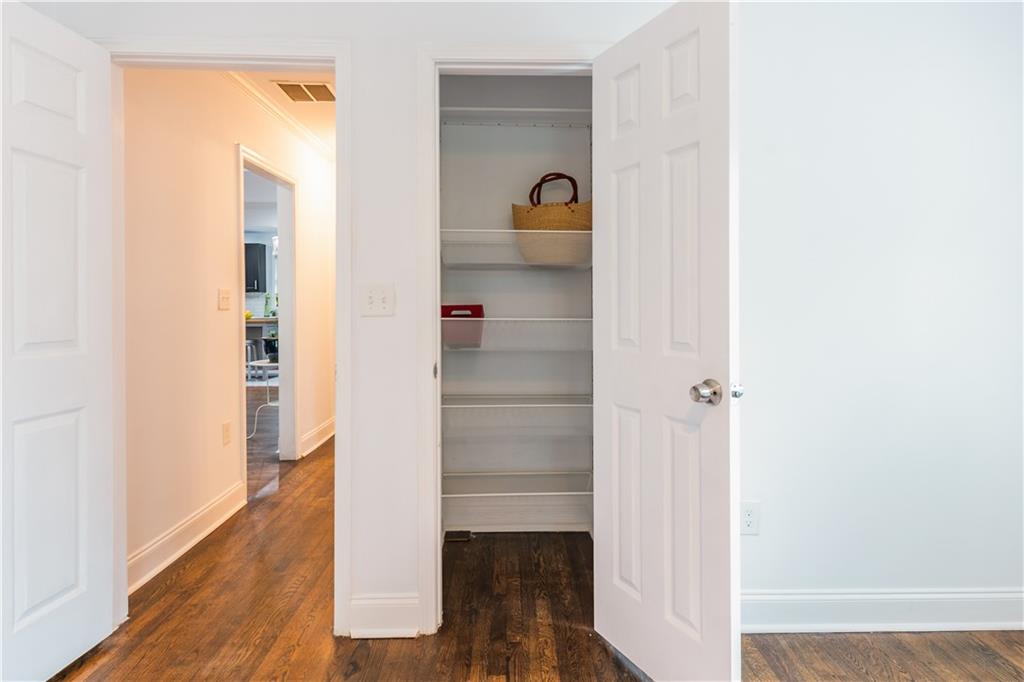 1760 Rogers Avenue Southwest Atlanta, GA 30310 - Photo 41 of 57 a view of empty room with wooden floor