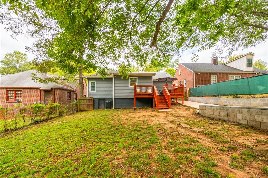 1760 Rogers Avenue Southwest Atlanta, GA 30310 - Photo 50 of 57 front view of a house with a yard