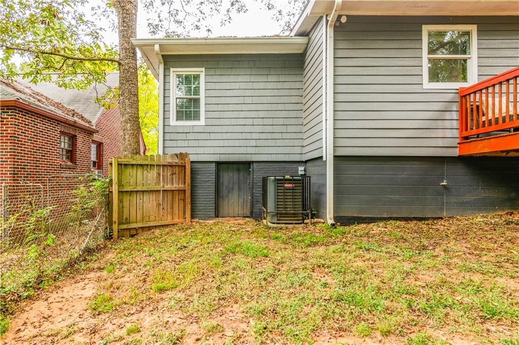 1760 Rogers Avenue Southwest Atlanta, GA 30310 - Photo 52 of 57 a front view of a house with a yard
