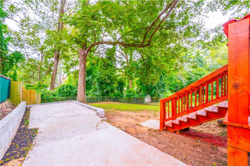 1760 Rogers Avenue Southwest Atlanta, GA 30310 - Photo 54 of 57 a view of a house with a yard
