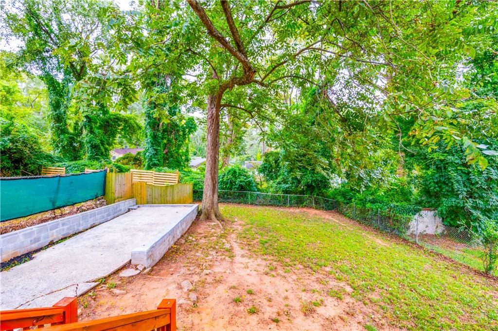 1760 Rogers Avenue Southwest Atlanta, GA 30310 - Photo 56 of 57 a view of a swimming pool with a patio and yard