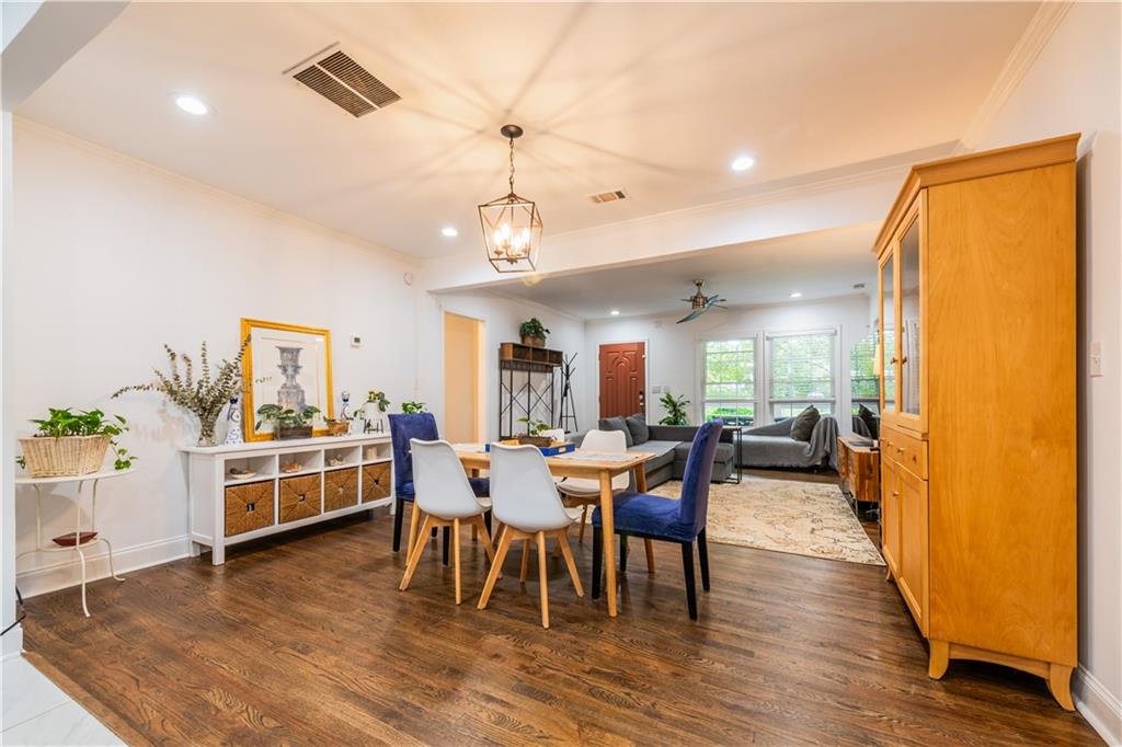 1760 Rogers Avenue Southwest Atlanta, GA 30310 - Photo 10 of 57 a view of a dining room with furniture window and wooden floor