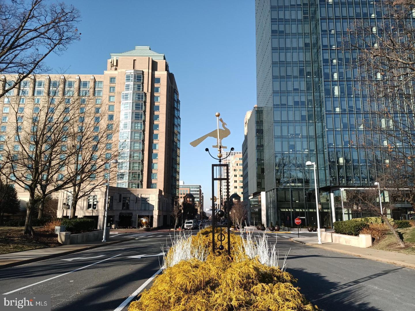 1891 Crescent Park Drive, Unit 110A Reston, VA 20190 - Photo 39 of 41 a view of a building with a street
