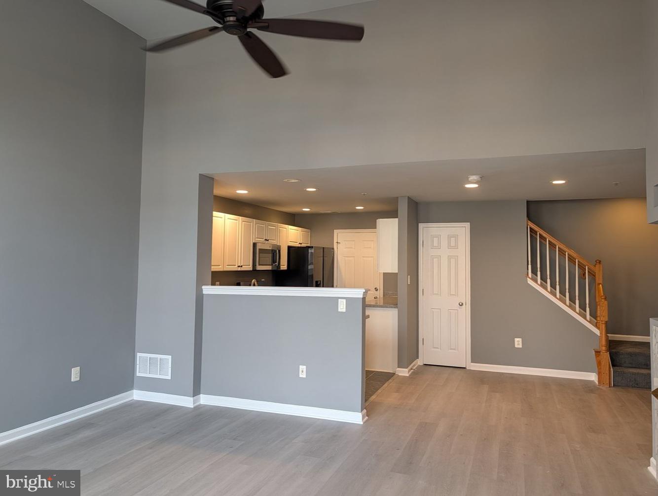 1891 Crescent Park Drive, Unit 110A Reston, VA 20190 - Photo 4 of 41 a view of a kitchen with a sink and cabinets