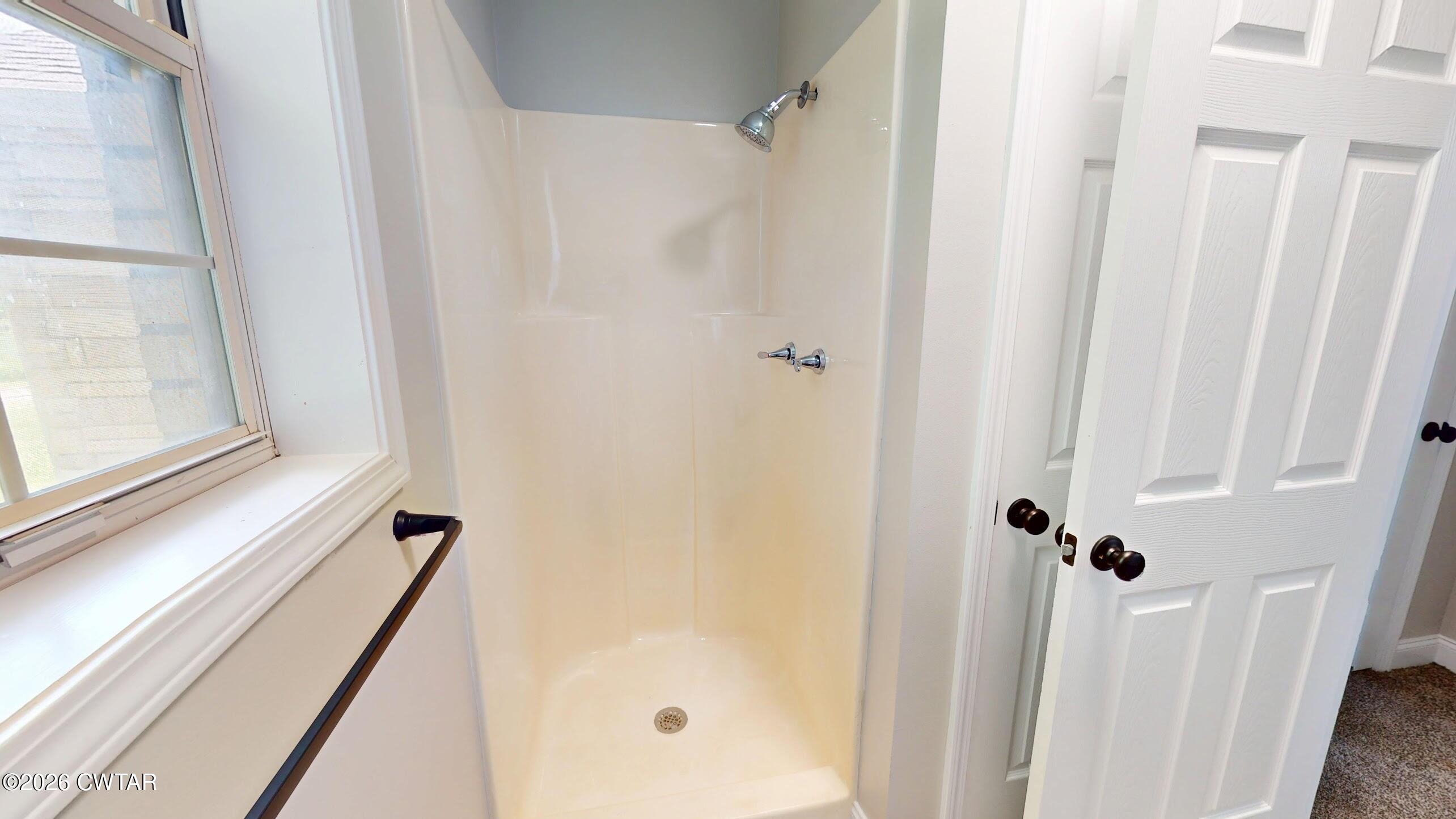 2800 Locust Grove Road Newbern, TN 38059 - Photo 38 of 46 a bathroom with a shower