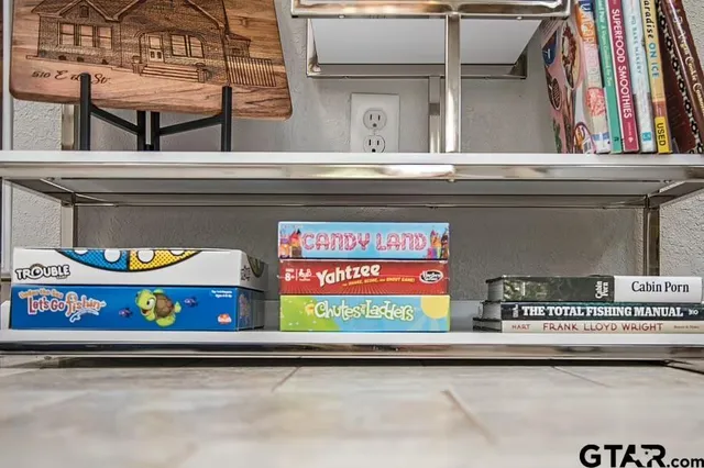 a bedroom with a bed and dresser