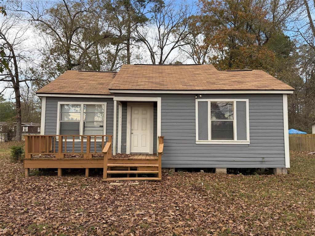 2240 Pin Oak Circle Haughton, LA 71037 - Photo 1 of 9 Bungalow-style house with roof with shingles and a deck