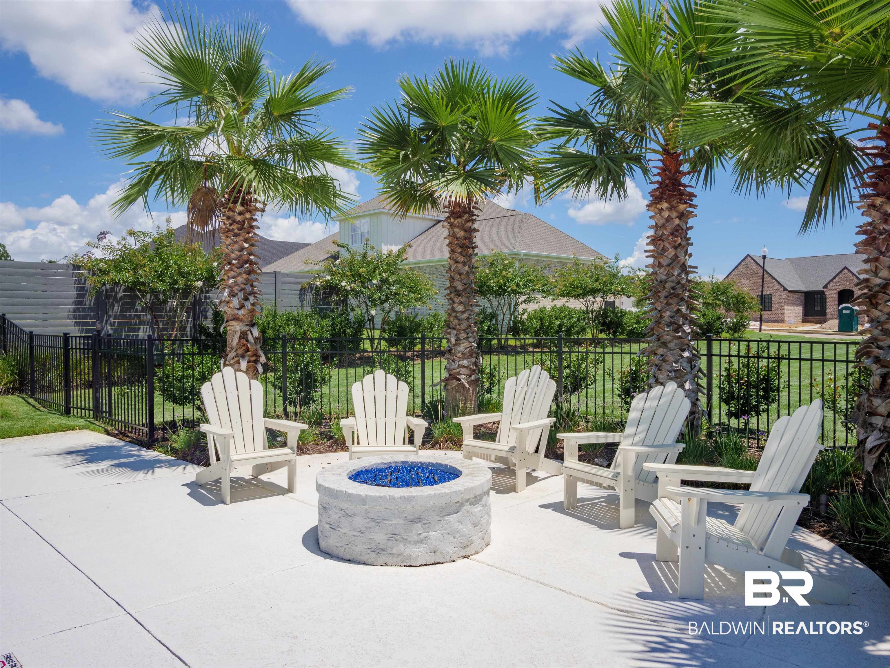 10970 Turin Avenue Fairhope, AL 36532 - Photo 57 of 61 View of patio featuring an outdoor fire pit and fence
