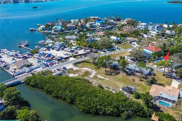 a view of a house with a lot of flowers