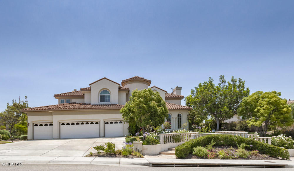 12054 Nelson Road Moorpark, CA 93021 - Photo 1 of 75 a front view of a house with a garden