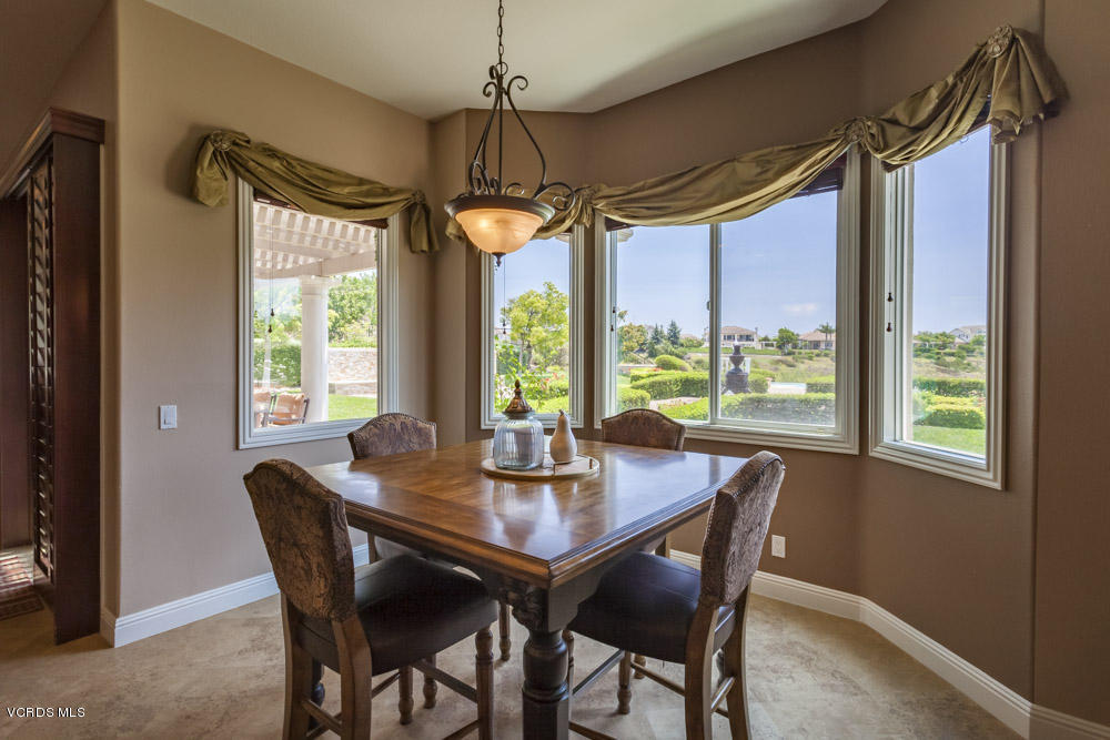 12054 Nelson Road Moorpark, CA 93021 - Photo 25 of 75 a view of a dining room with furniture window and outside view