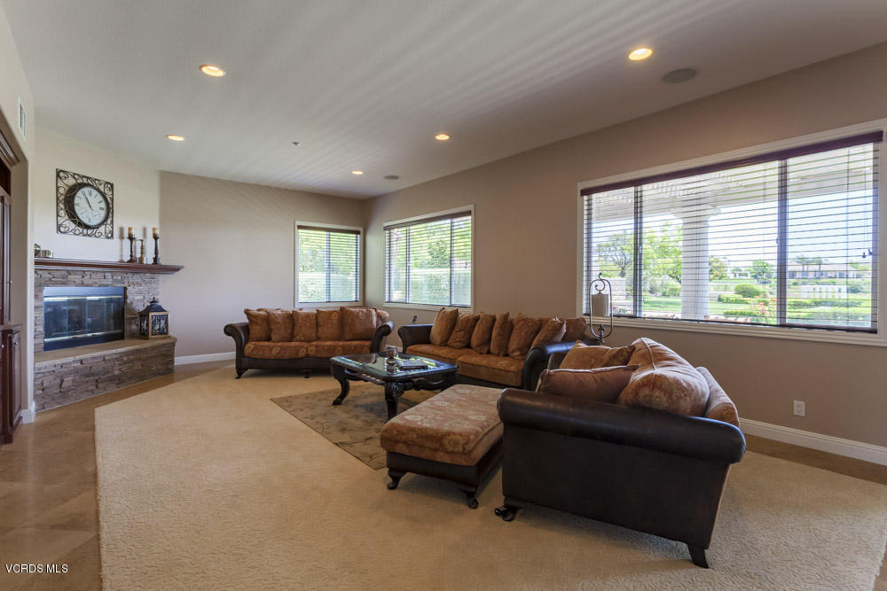 12054 Nelson Road Moorpark, CA 93021 - Photo 26 of 75 a living room with furniture and a fireplace