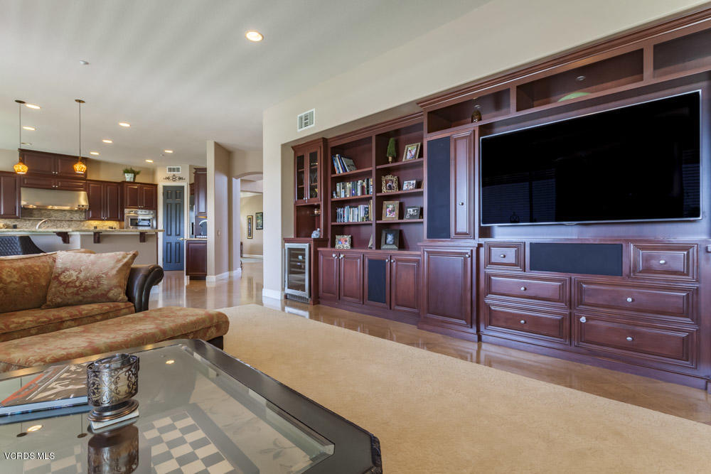 12054 Nelson Road Moorpark, CA 93021 - Photo 27 of 75 a living room with furniture and a flat screen tv