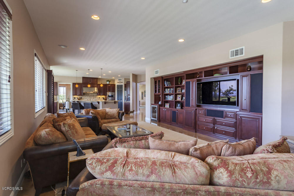12054 Nelson Road Moorpark, CA 93021 - Photo 28 of 75 a living room with furniture and a flat screen tv