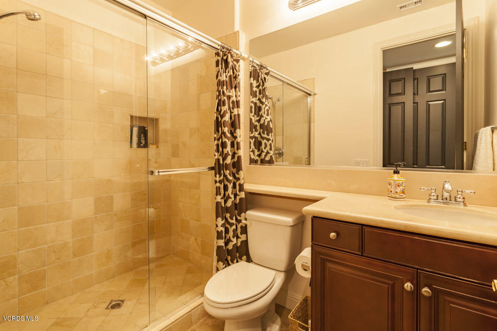 12054 Nelson Road Moorpark, CA 93021 - Photo 32 of 75 a bathroom with a sink a toilet and shower