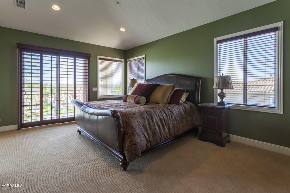 12054 Nelson Road Moorpark, CA 93021 - Photo 34 of 75 a bedroom with a bed and a couch