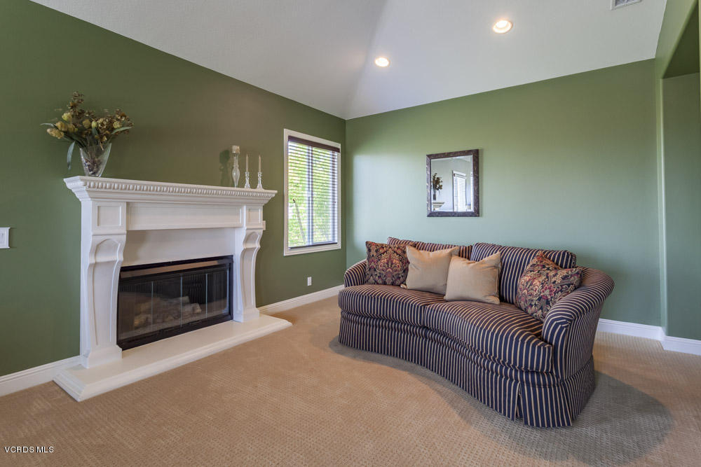 12054 Nelson Road Moorpark, CA 93021 - Photo 35 of 75 a living room with furniture and a fireplace