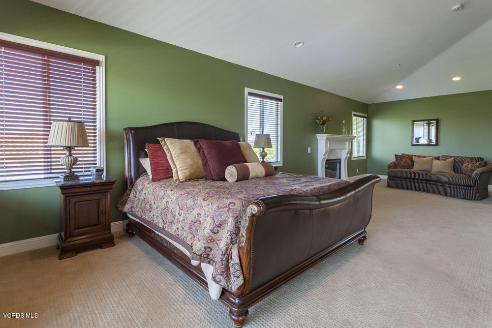 12054 Nelson Road Moorpark, CA 93021 - Photo 37 of 75 a bed room with a bed and a dresser