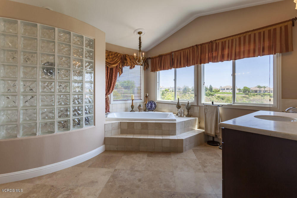 12054 Nelson Road Moorpark, CA 93021 - Photo 38 of 75 a living room with a large window and a table