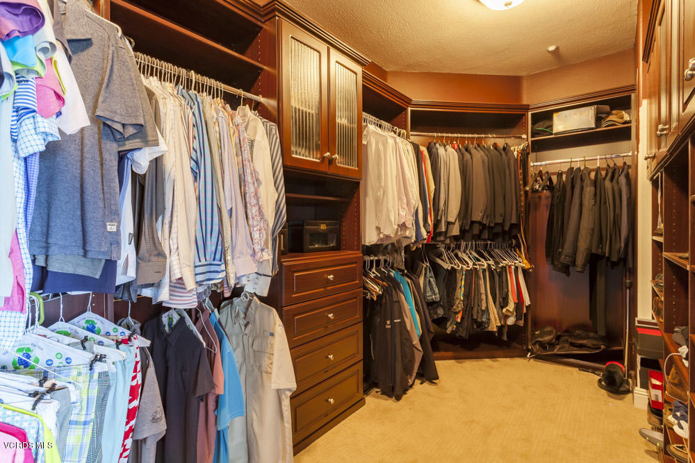 12054 Nelson Road Moorpark, CA 93021 - Photo 41 of 75 a view of walk in closet with clothes