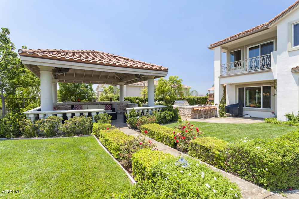 12054 Nelson Road Moorpark, CA 93021 - Photo 54 of 75 a view of a house with backyard sitting area and swimming pool