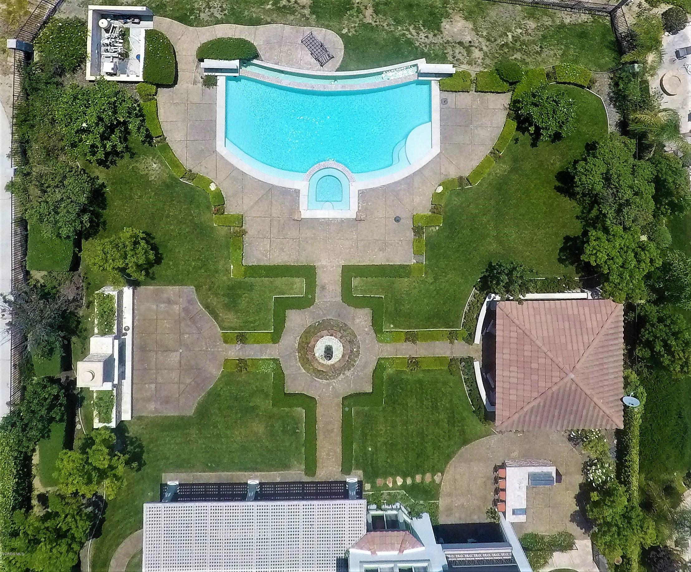 12054 Nelson Road Moorpark, CA 93021 - Photo 67 of 75 an aerial view of a house with outdoor space pool seating area and yard