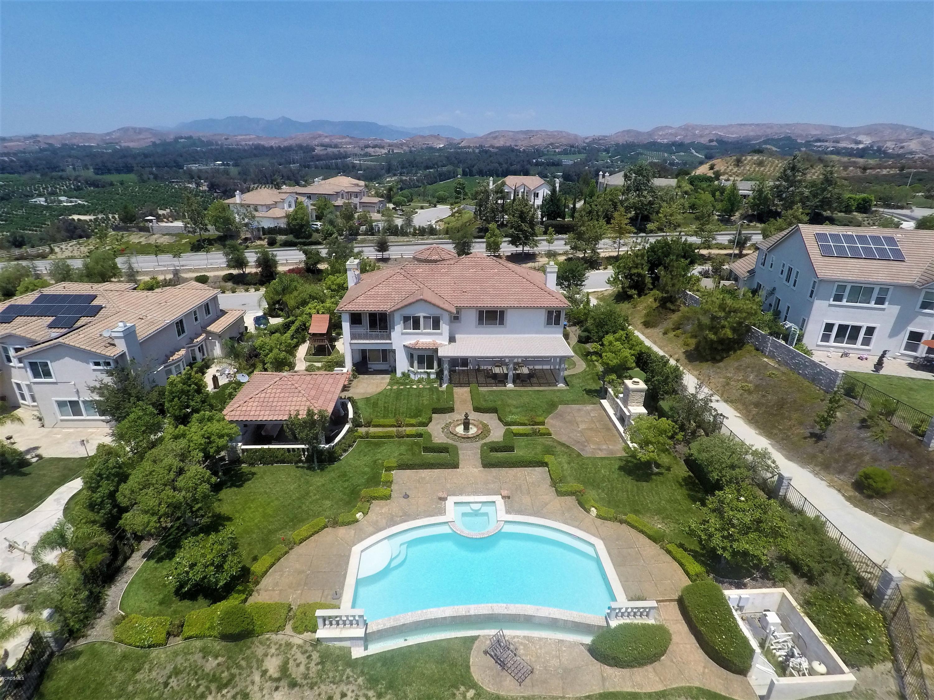 12054 Nelson Road Moorpark, CA 93021 - Photo 69 of 75 an aerial view of residential houses with outdoor space and trees