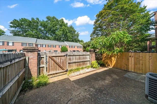 a view of a wrought iron fences in front of house