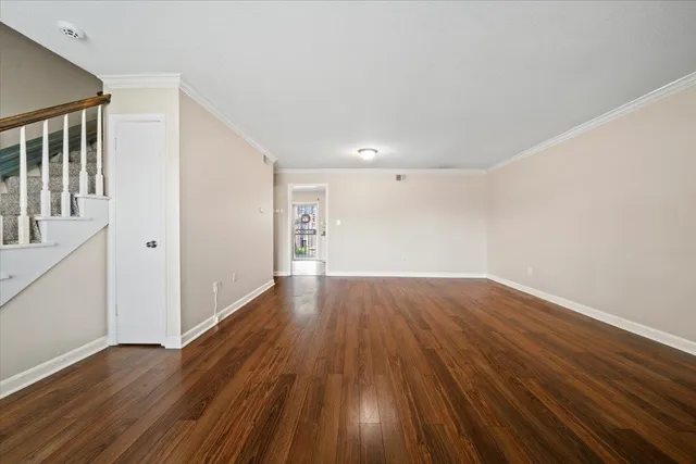 a view of wooden floor in an empty room