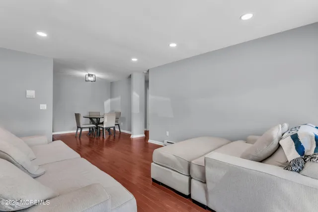 a living room with furniture and a table